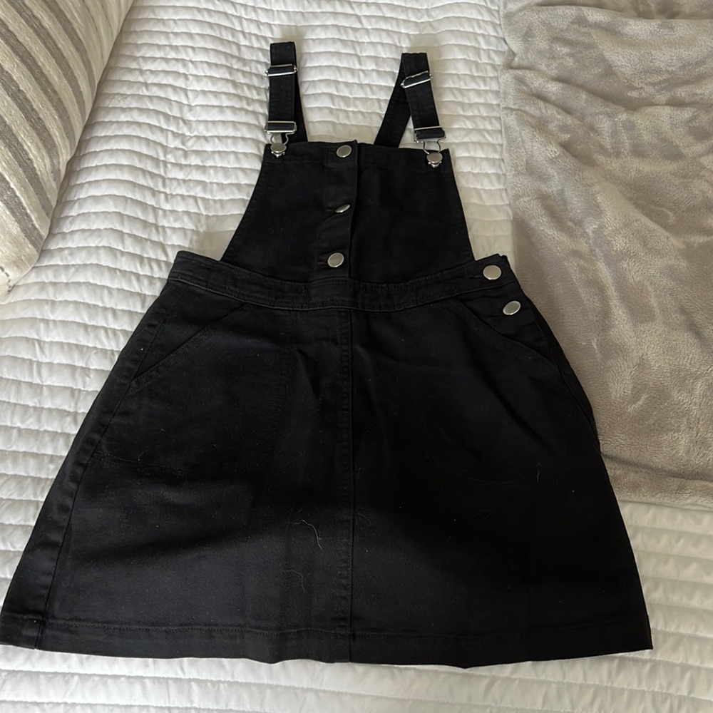 Black, overall mini skirt.